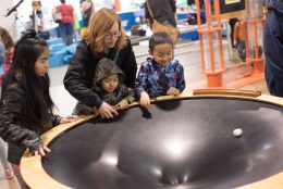 visitors at an exhibit