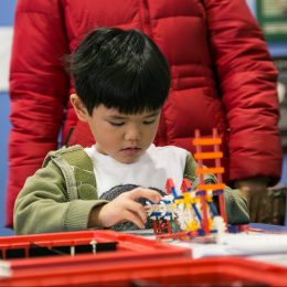 Child Playing With Lancster Science Factory Exhibit
