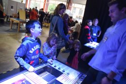 Child Playing With Lancster Science Factory Exhibit