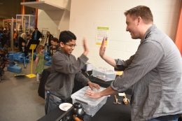 Child Playing With Lancster Science Factory Exhibit
