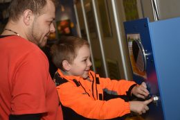 Child Playing With Lancster Science Factory Exhibit