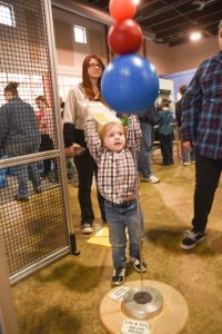 Child Playing With Lancster Science Factory Exhibit