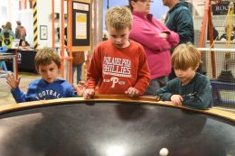 Child Playing With Lancster Science Factory Exhibit