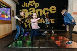 Kids dancing on the Sustainable Energy Dance Floor at Lancaster Science Factory!